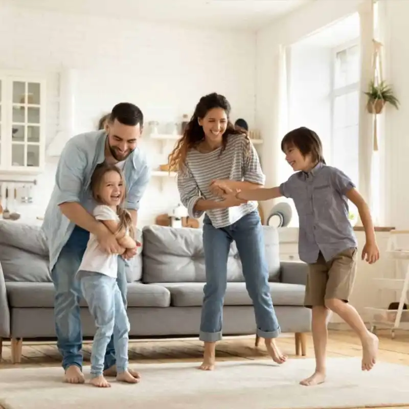 Our Process - Step 6 Close, Fund and Receive the Keys to your Dream Home family playing in house with chilgren